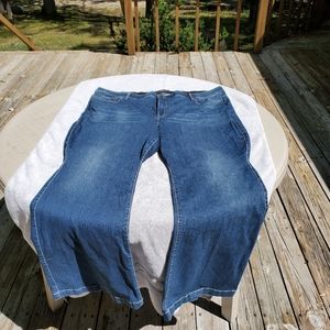 TORRID Feel The Fit Bombshell Flare Jeans